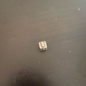 2 for $10 Silver coloured U charm